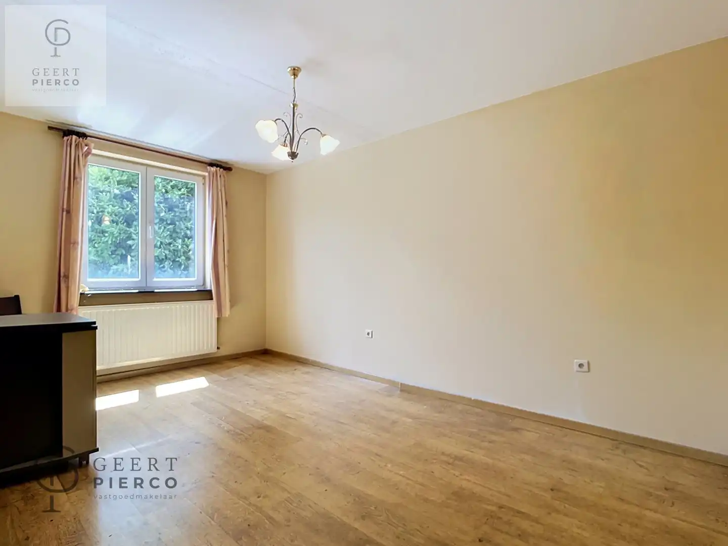 Instapklaar gelijkvloers appartement met garagebox en tuin in Landen foto 13