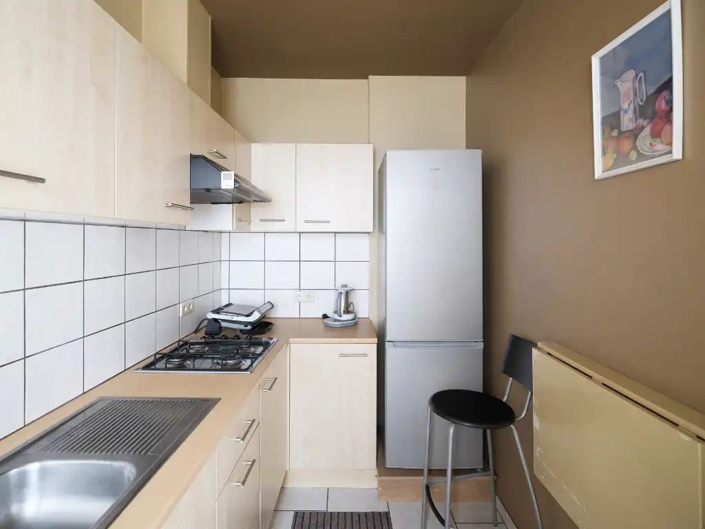 Opbrengsteigendom bestaande uit verschillende studio's en éénslaapkamer­appartementen in het centrum van Gent. foto 11