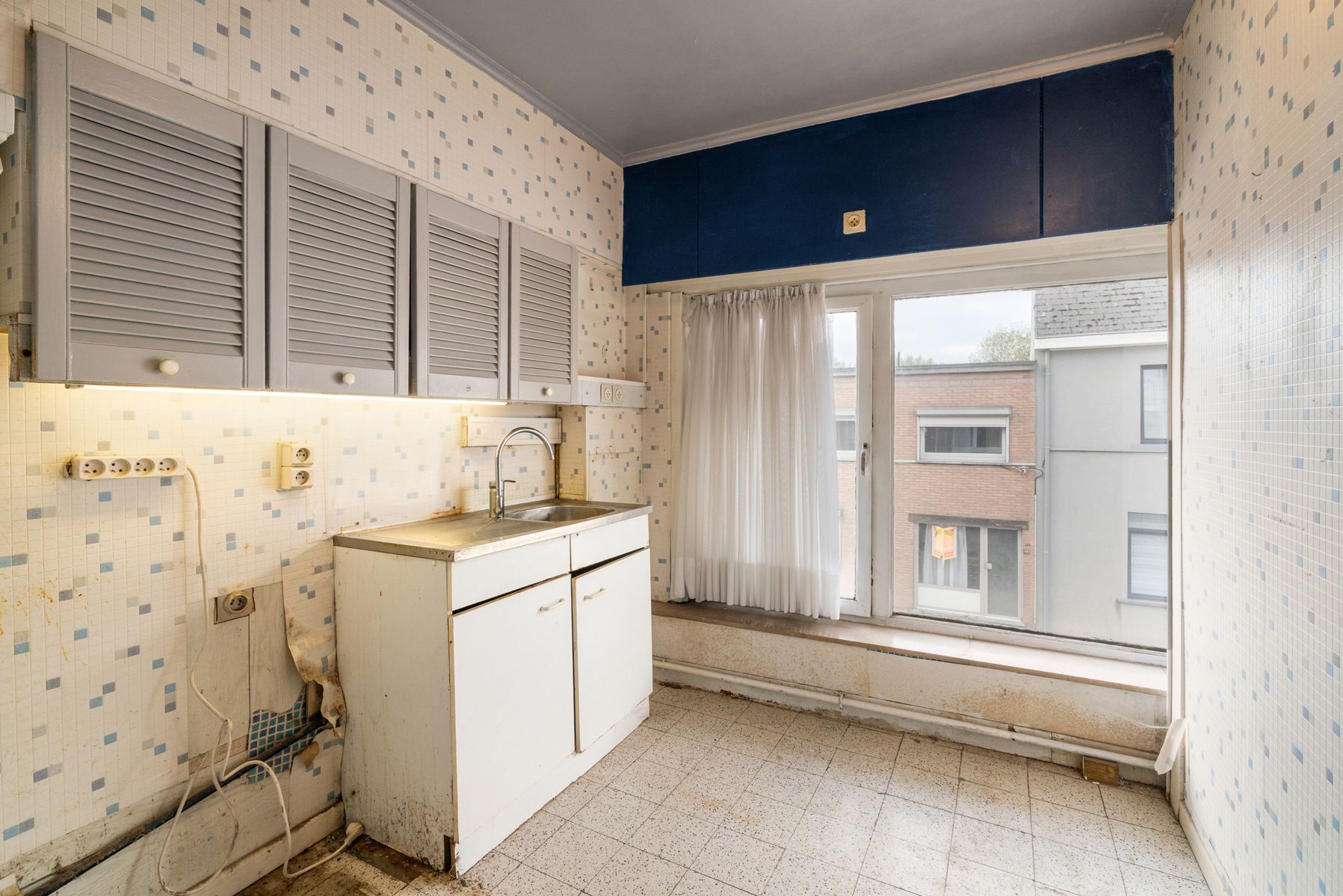 Te renoveren 2-slaapkamer appartement in het centrum van Erembodegem foto 7