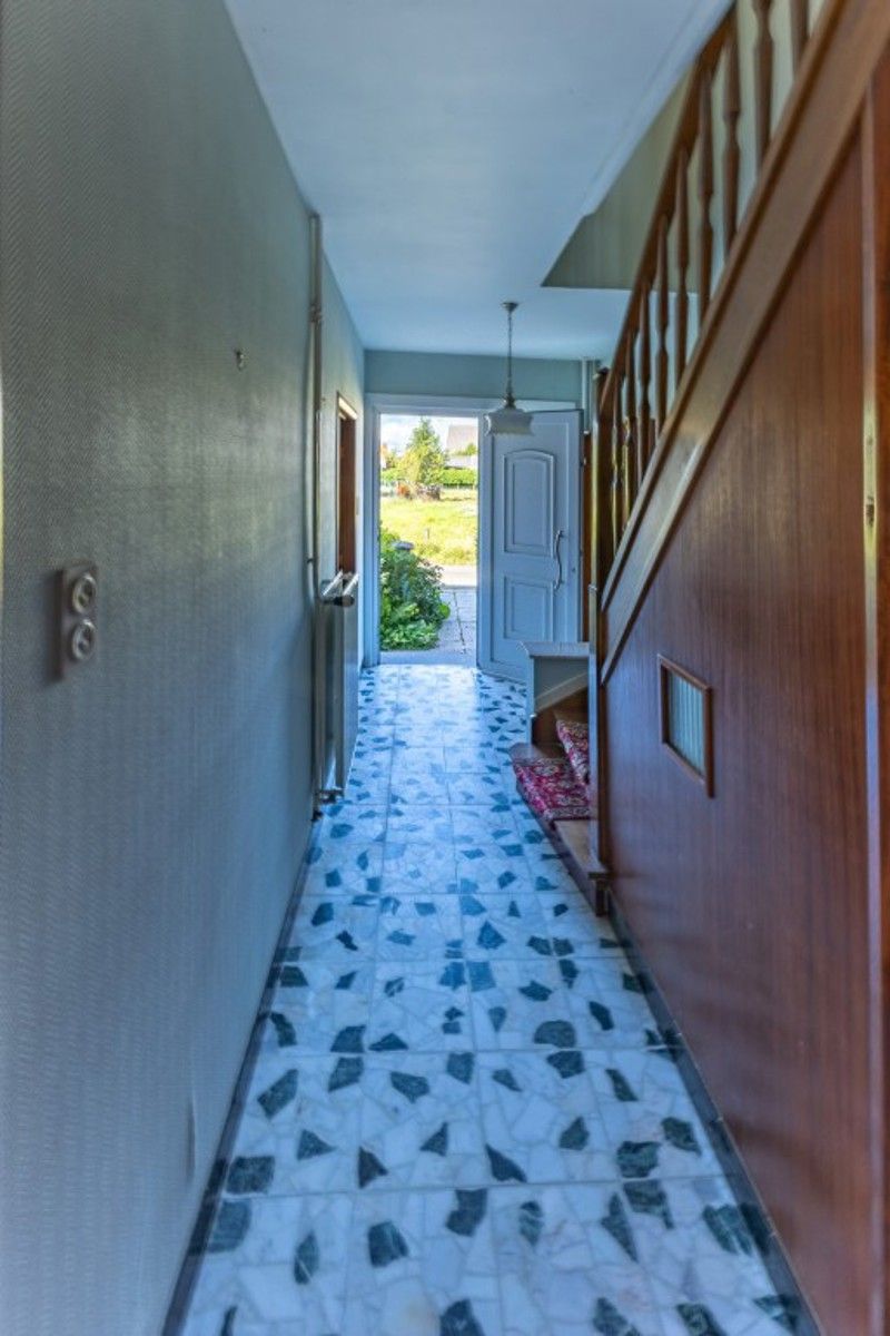 Gezinswoning met grote tuin in groene omgeving foto 8