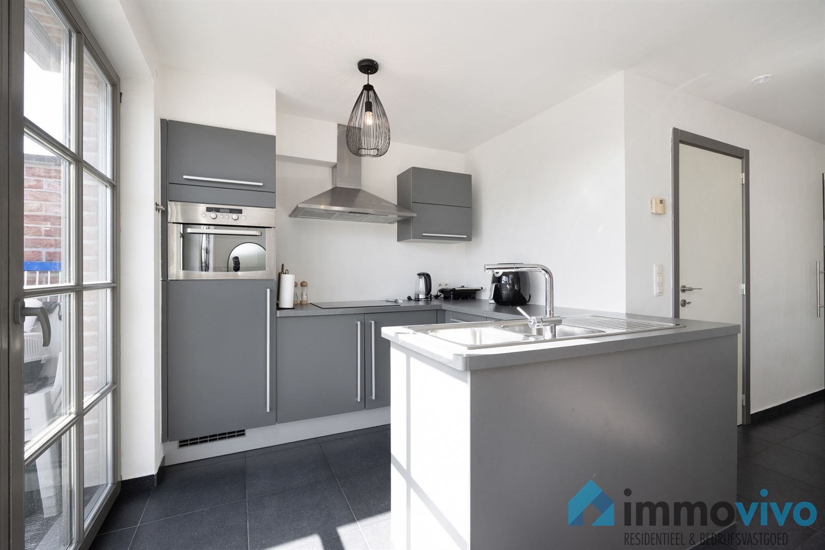 Stijlvol 2-slaapkamerappartement met groot terras en lift (bouwjaar 2007). foto 8