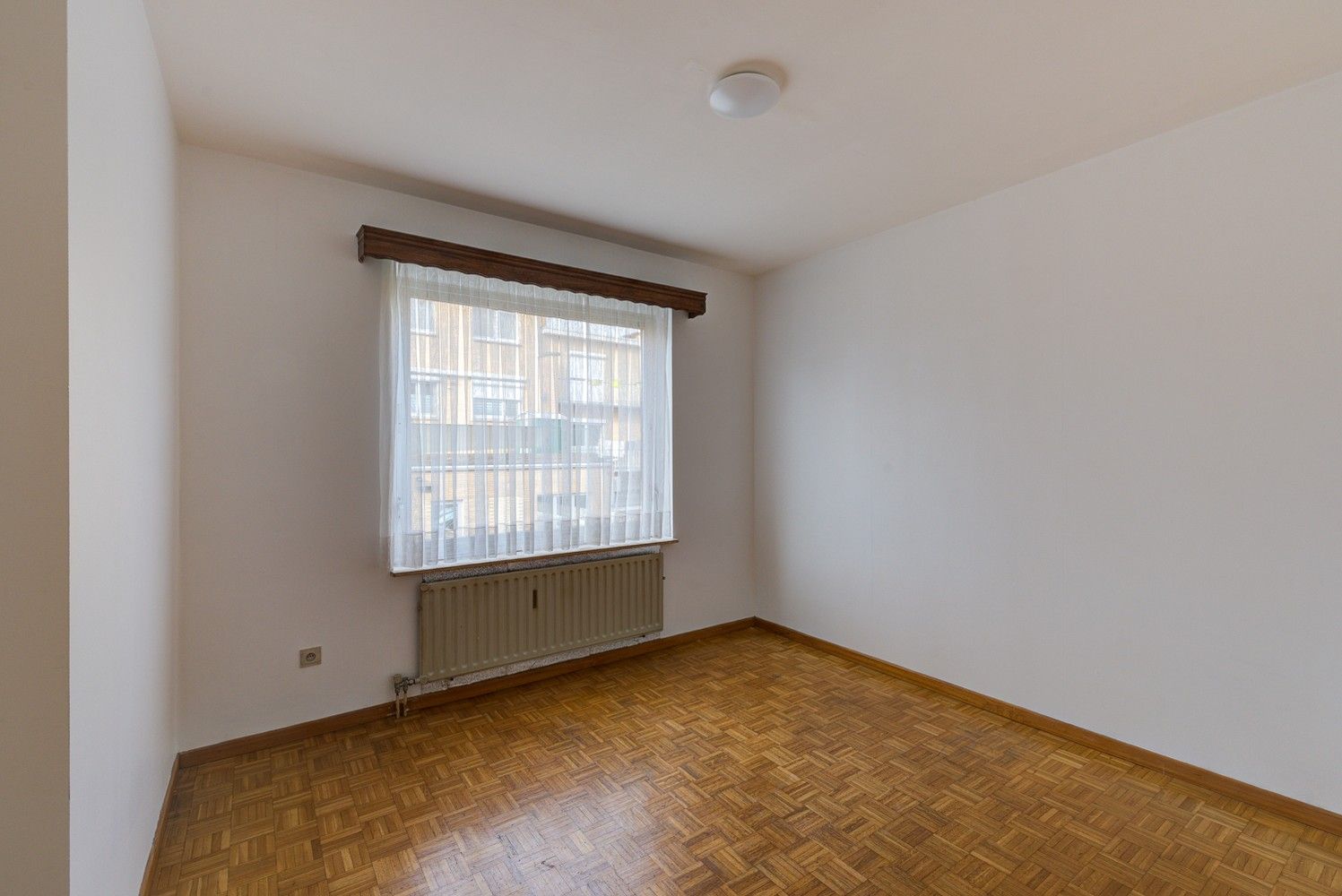 VERZORGD APPARTEMENT MET 3 SLAAPKAMERS, RUIM TERRAS EN AUTOSTAANPLAATS NABIJ HET CENTRUM VAN BILZEN foto 13