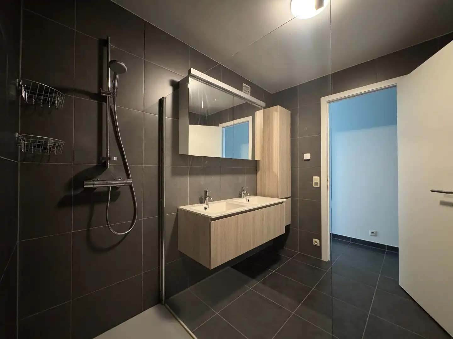 Te huur in Merchtem: ruim appartement 2 slpk + 2 autostaanplaatsen + kelder foto 14