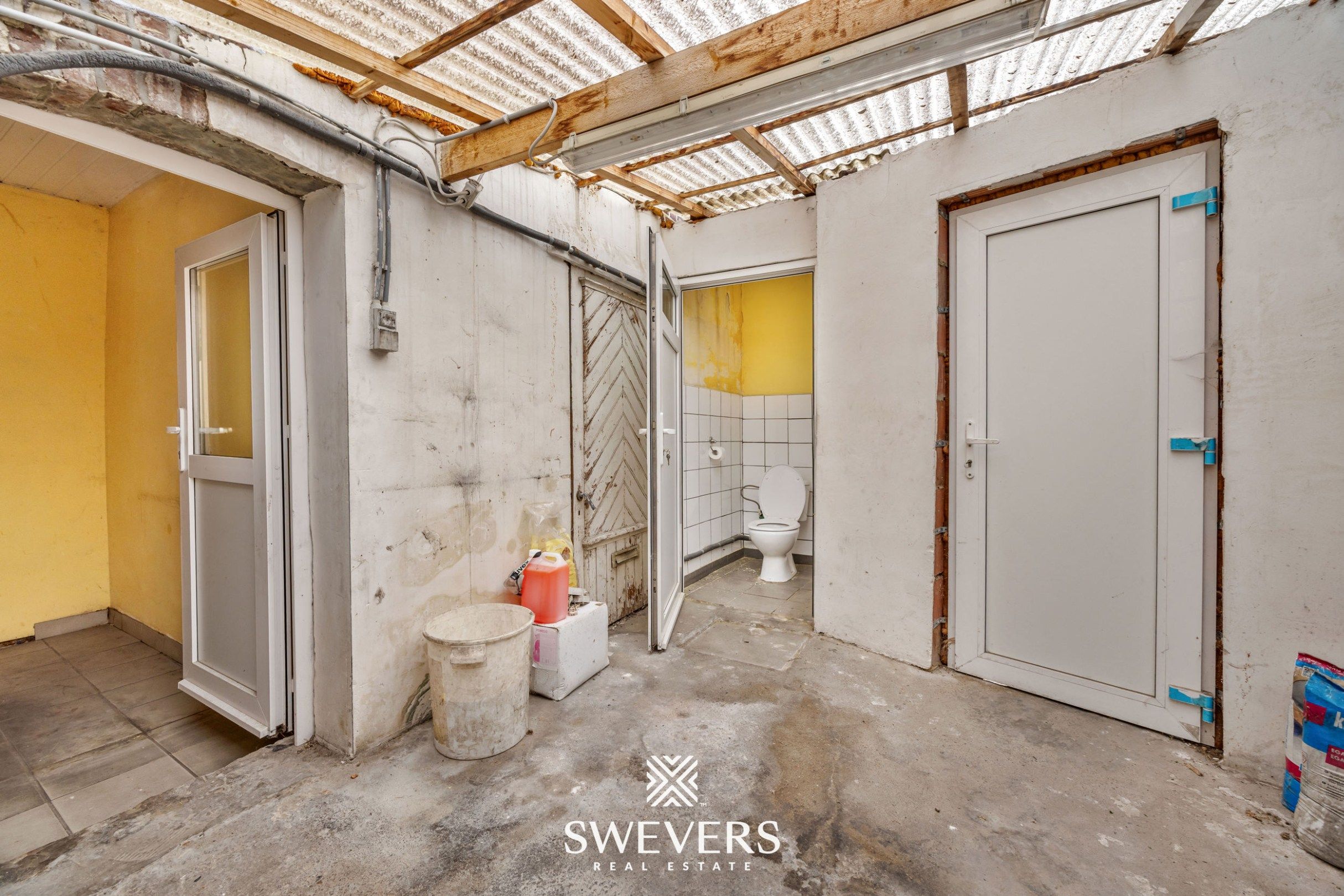 Te renoveren open bebouwing met groot perceel in rustige straat in Bilzen foto 11