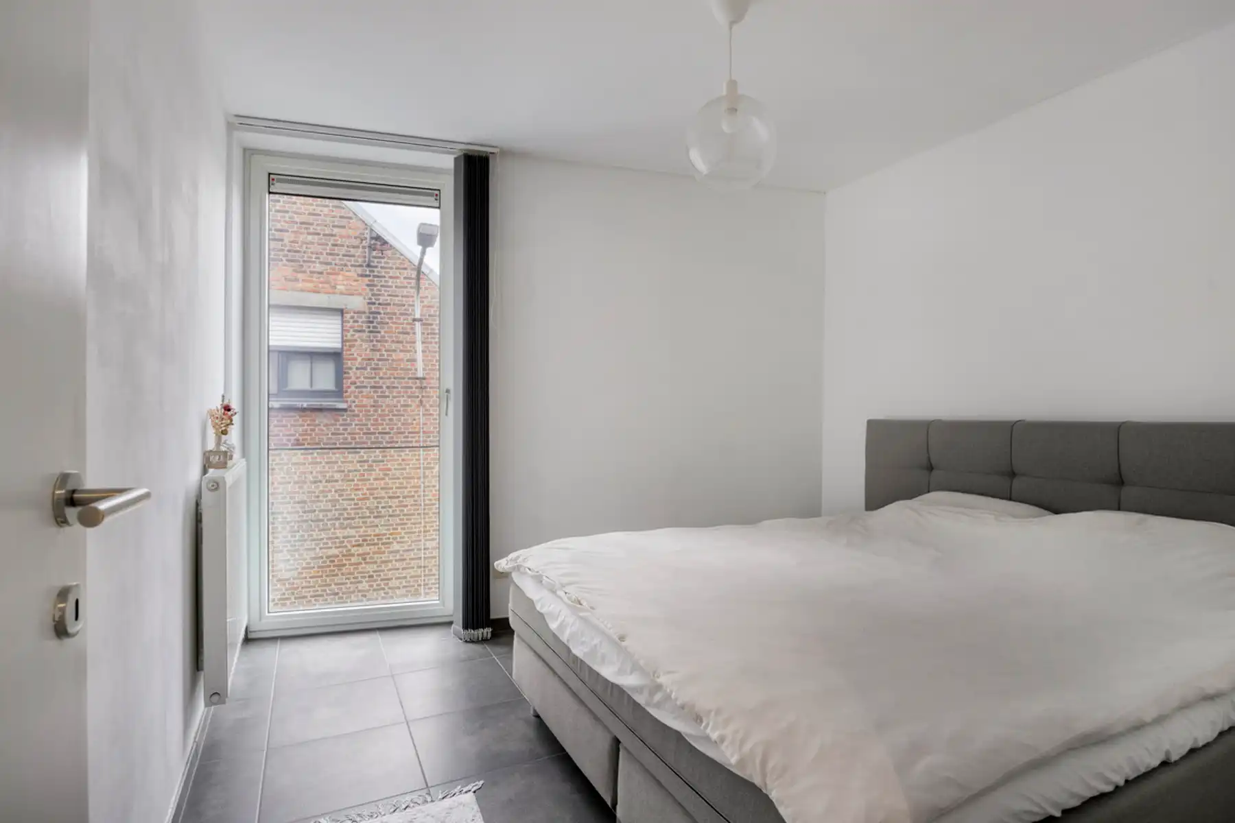 Energiezuinig appartement + autostaanplaats + kelder-berging foto 14