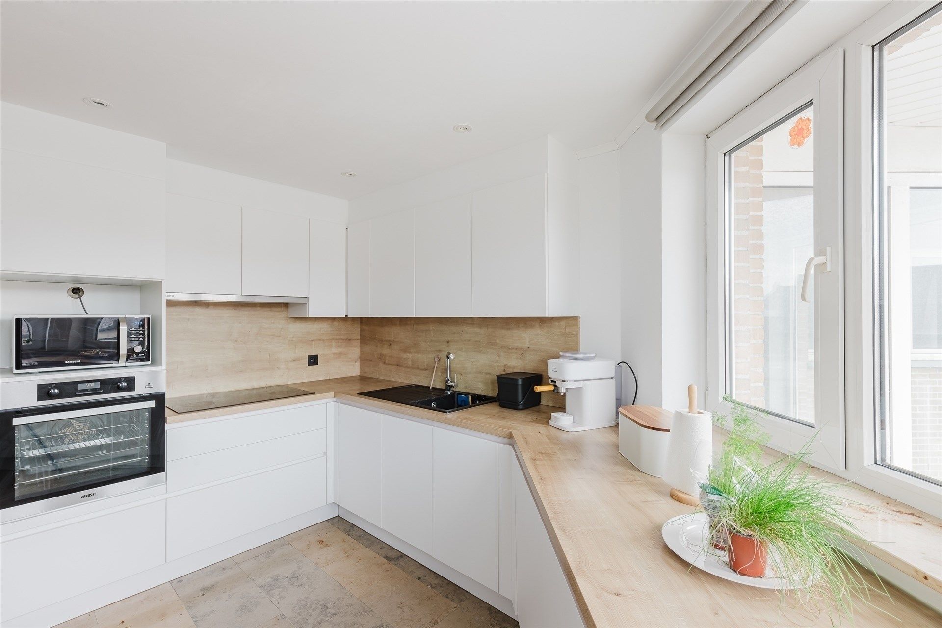 Fijn instap-klaar twee slaapkamer appartement in Wetteren centrum foto 14