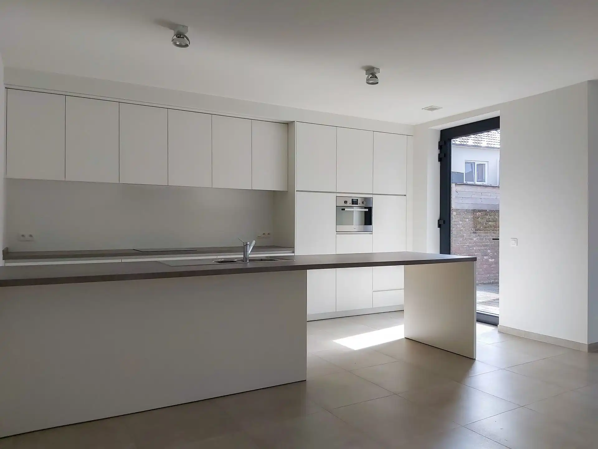 Instapklare patiowoning met 3 slaapkamers en 2 autostaanplaatsen in het rustige Uikhoven/Maasmechelen! foto 8