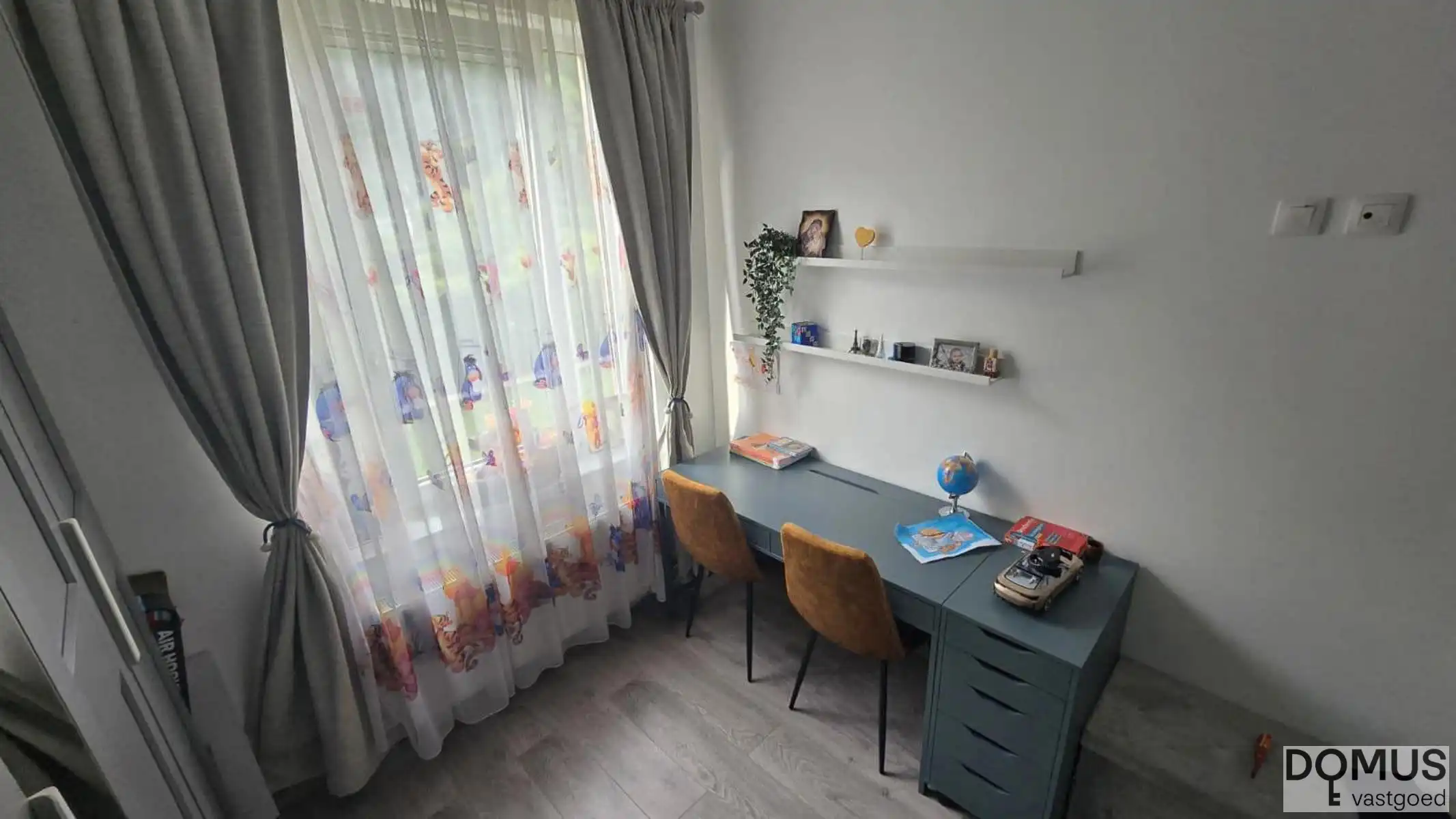 Gelijkvloersappartement met 2 slaapkamers foto 7