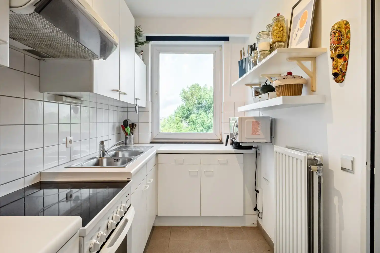 Verzorgd appartement met prachtig zicht en 2 slaapkamers! foto 11