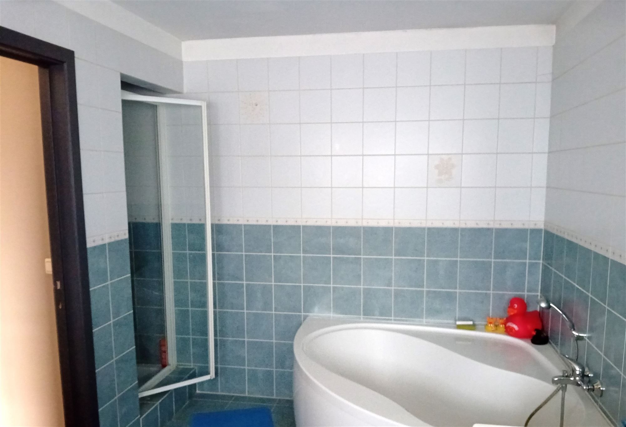 Rustig gelegen woning met 3 slaapkamers, garage en aangename tuin foto 9