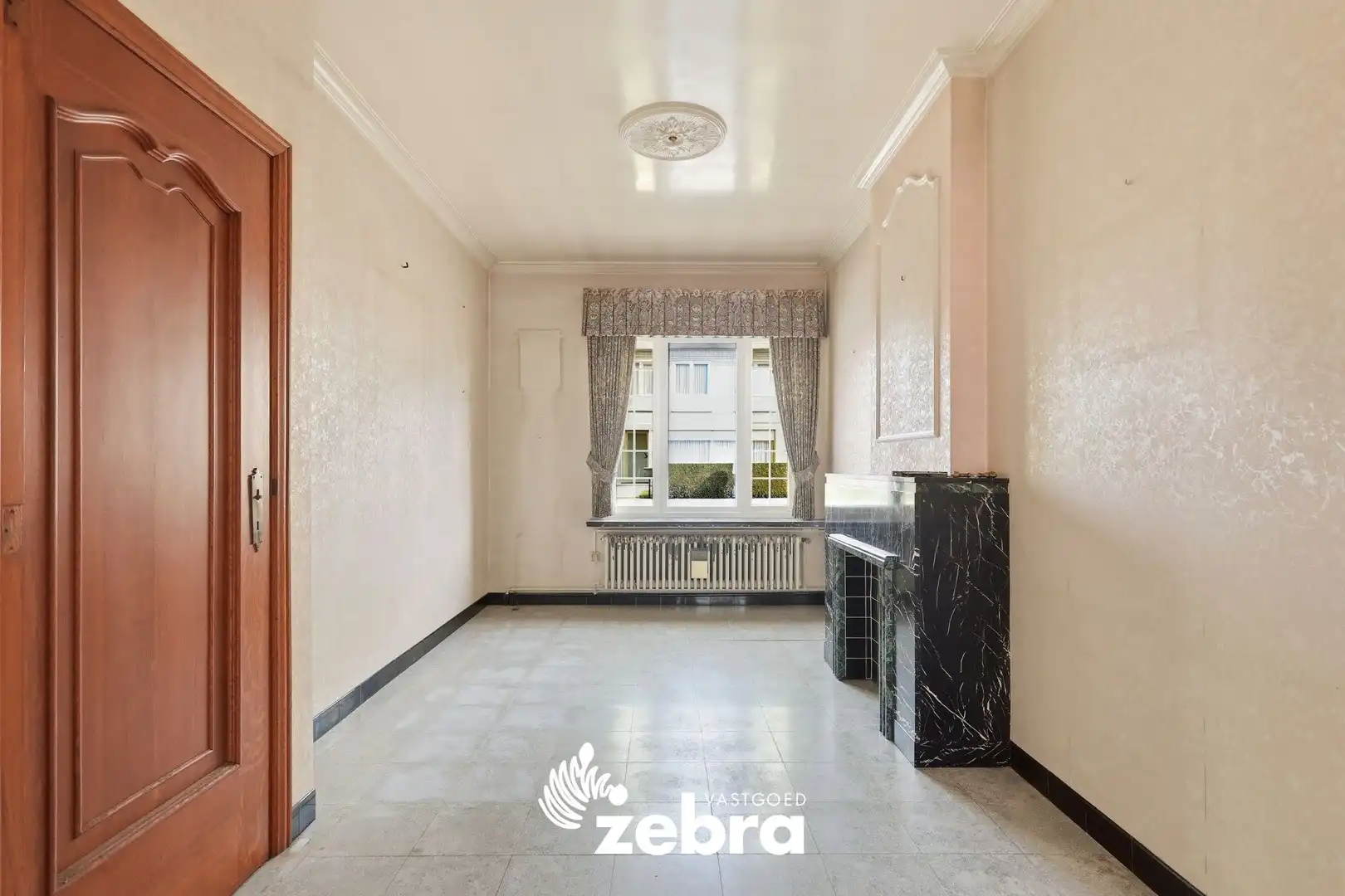 Woning met veel potentieel, 3 slaapkamers en ruime zolder in hartje Tielt! foto 6