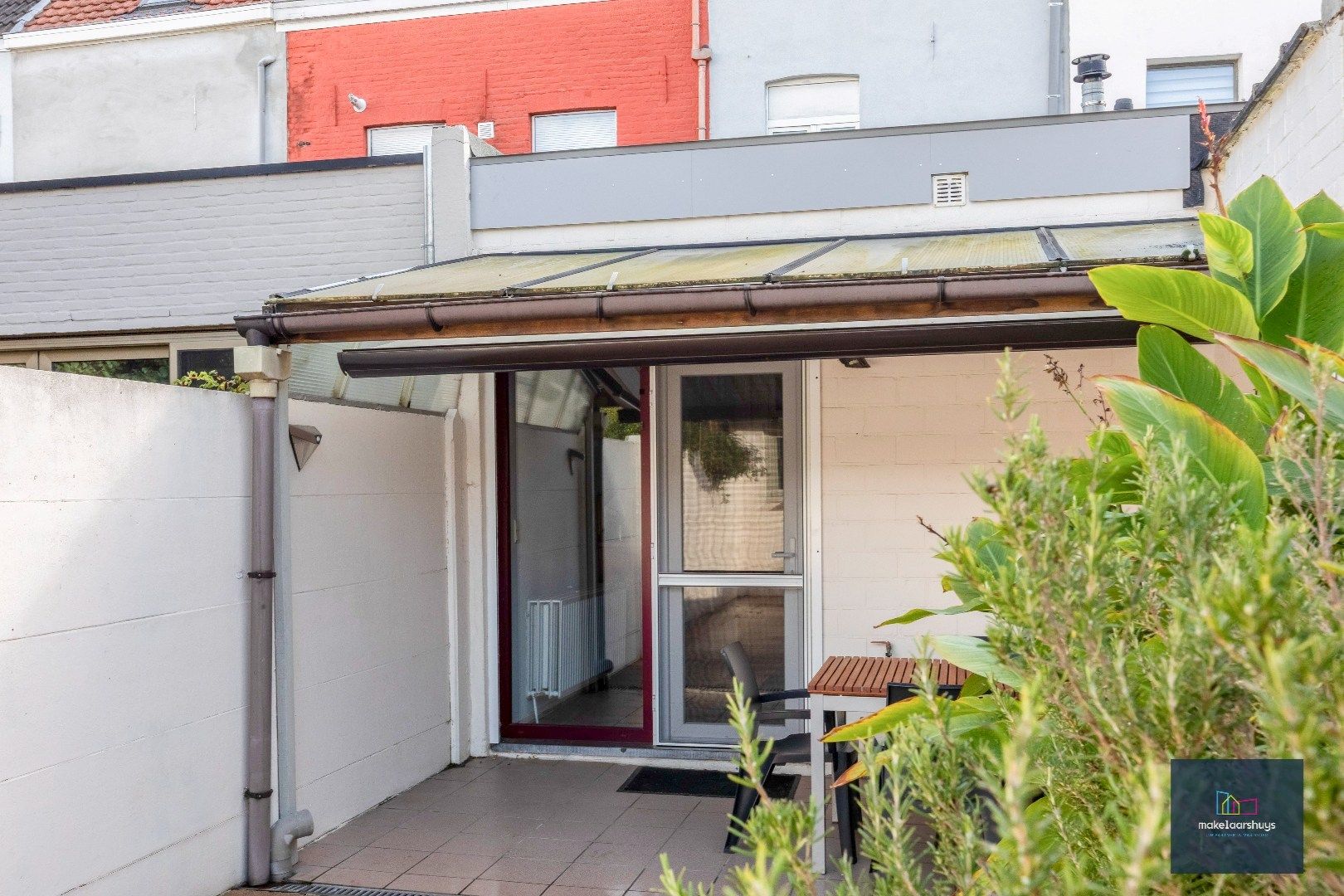 Charmante op te frissen rijwoning met ruime stadstuin  foto 20