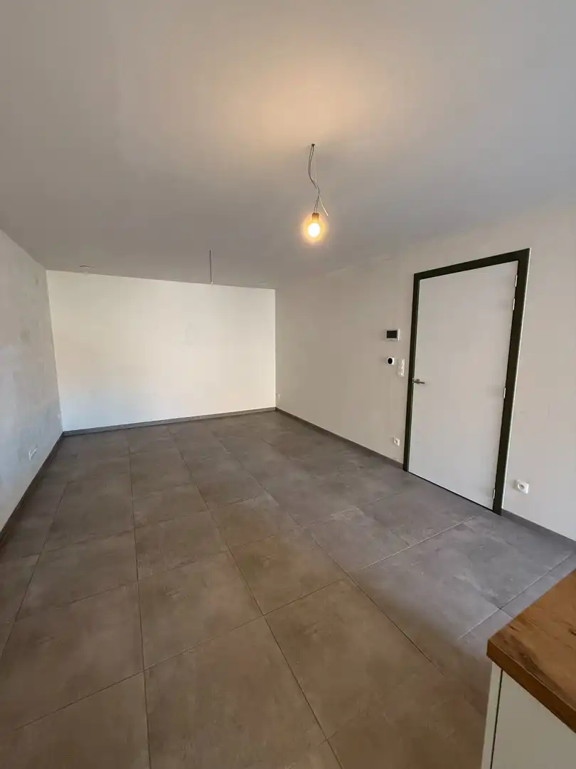 Instapklaar en energiezuinig gelijkvloers appartement met 1 slaapkamer en ruim terras te Riemst. foto 6