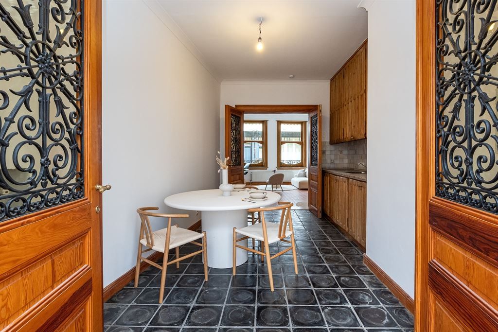Uitzonderlijk gelijkvloersappartement met stadstuin foto 8