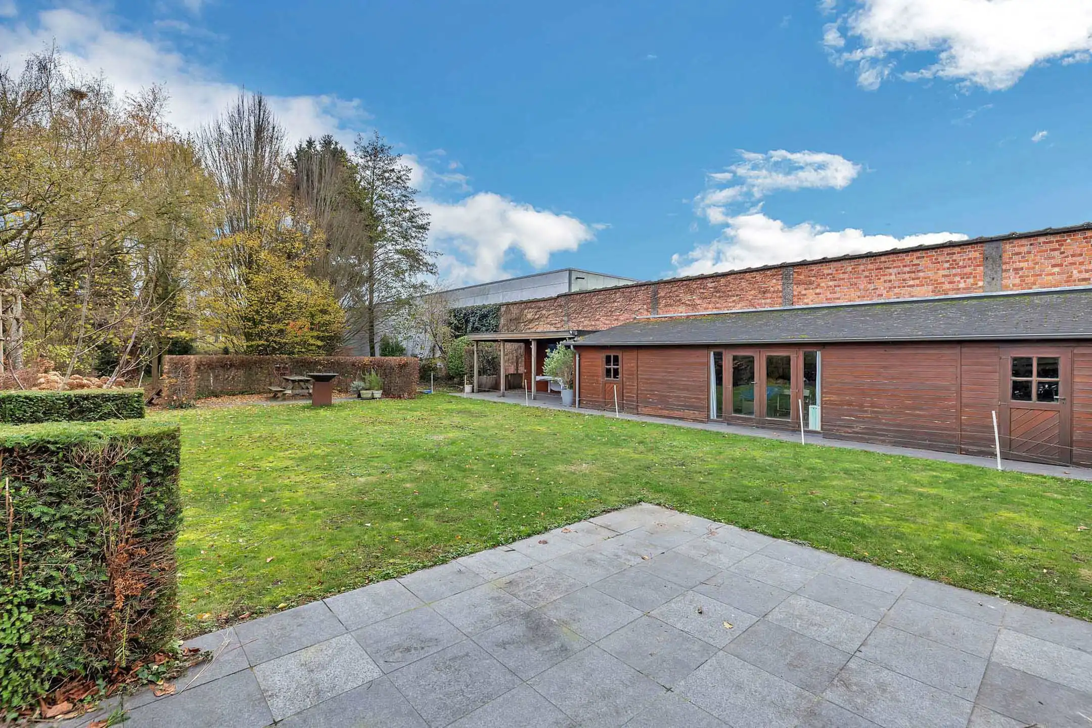 Unieke combinatie van wooncomfort, atelier en polyvalente tuin foto 24