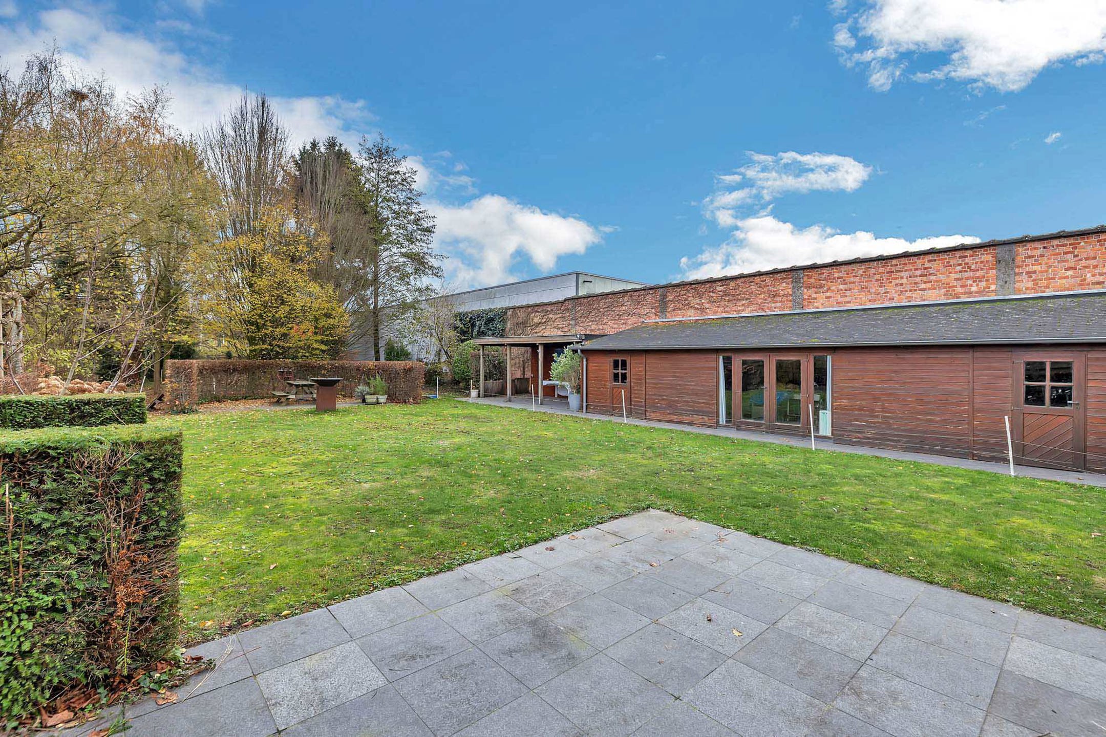 Unieke combinatie van wooncomfort, atelier en polyvalente tuin foto 24