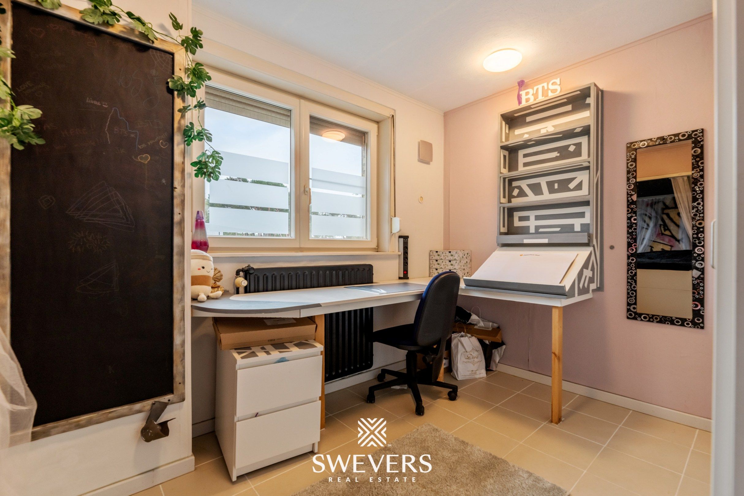 Instapklare gezinswoning met 3 slaapkamers, ruime kelder en zuidgerichte tuin in Beringen foto 20