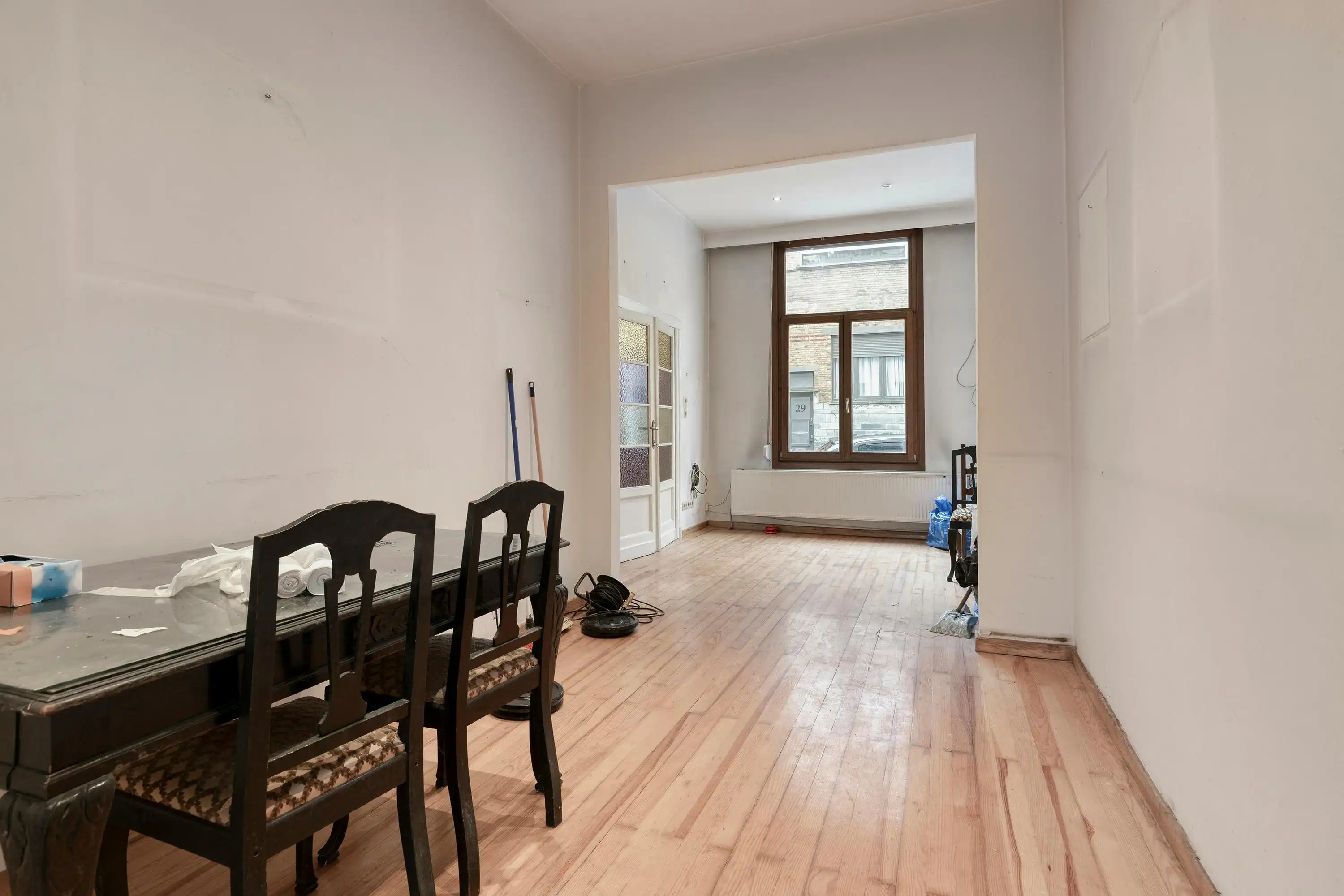 Op te frissen huis met 4 slaapkamers te koop in Borgerhout! foto 4