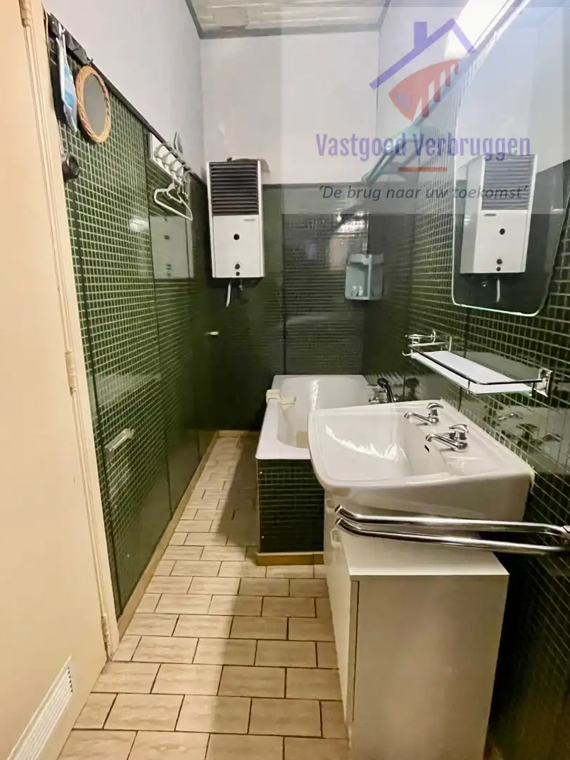 Te renoveren stadswoning in centrum Aalst foto 6