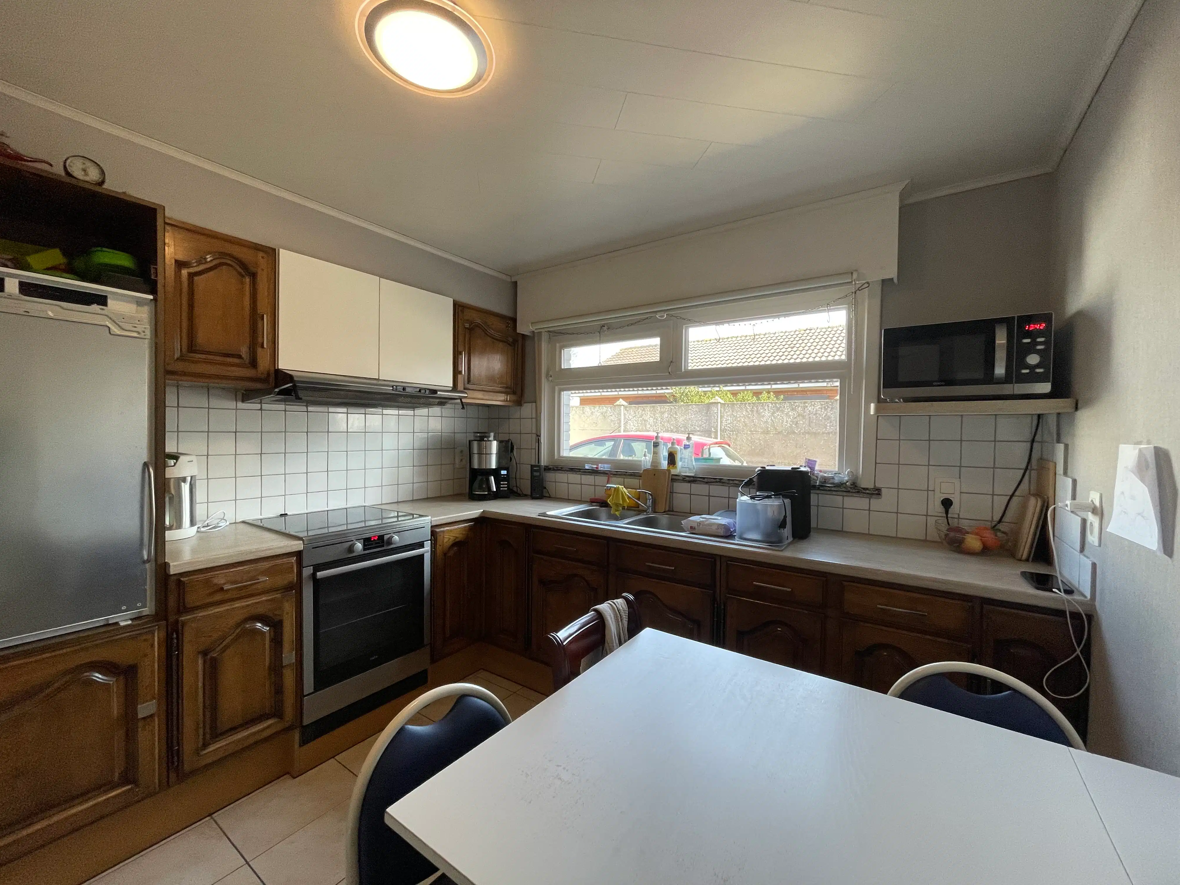 Ruime halfopen bebouwing met 3 slaapkamers, tuin en garage foto 6