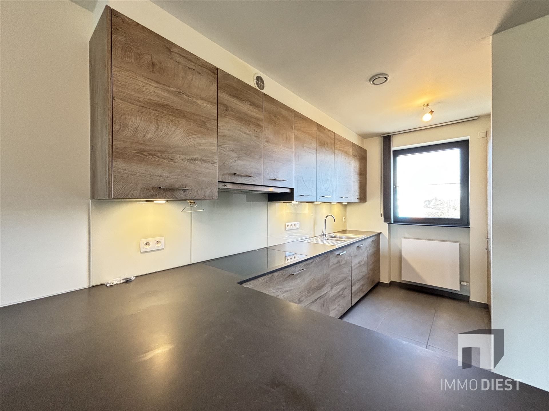 Ruim appartement op de tweede verdieping in het centrum van Tessenderlo foto 5