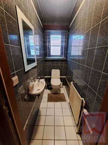 Grote ruime woning met 4 slaapkamers, tuin, garage en carport foto 4