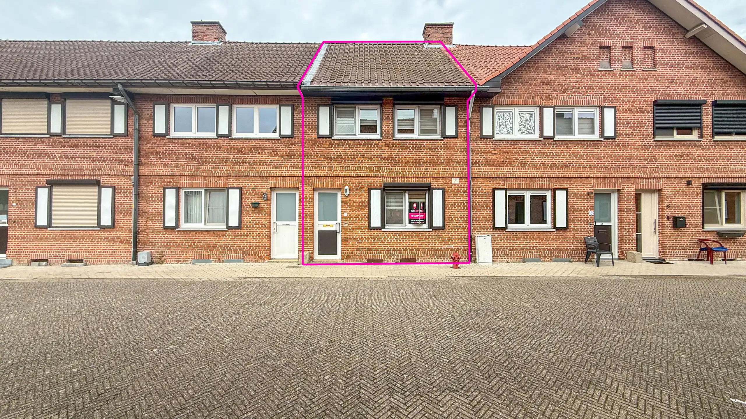 Gezinswoning met 4 slaapkamers centraal in Heusden! foto 2