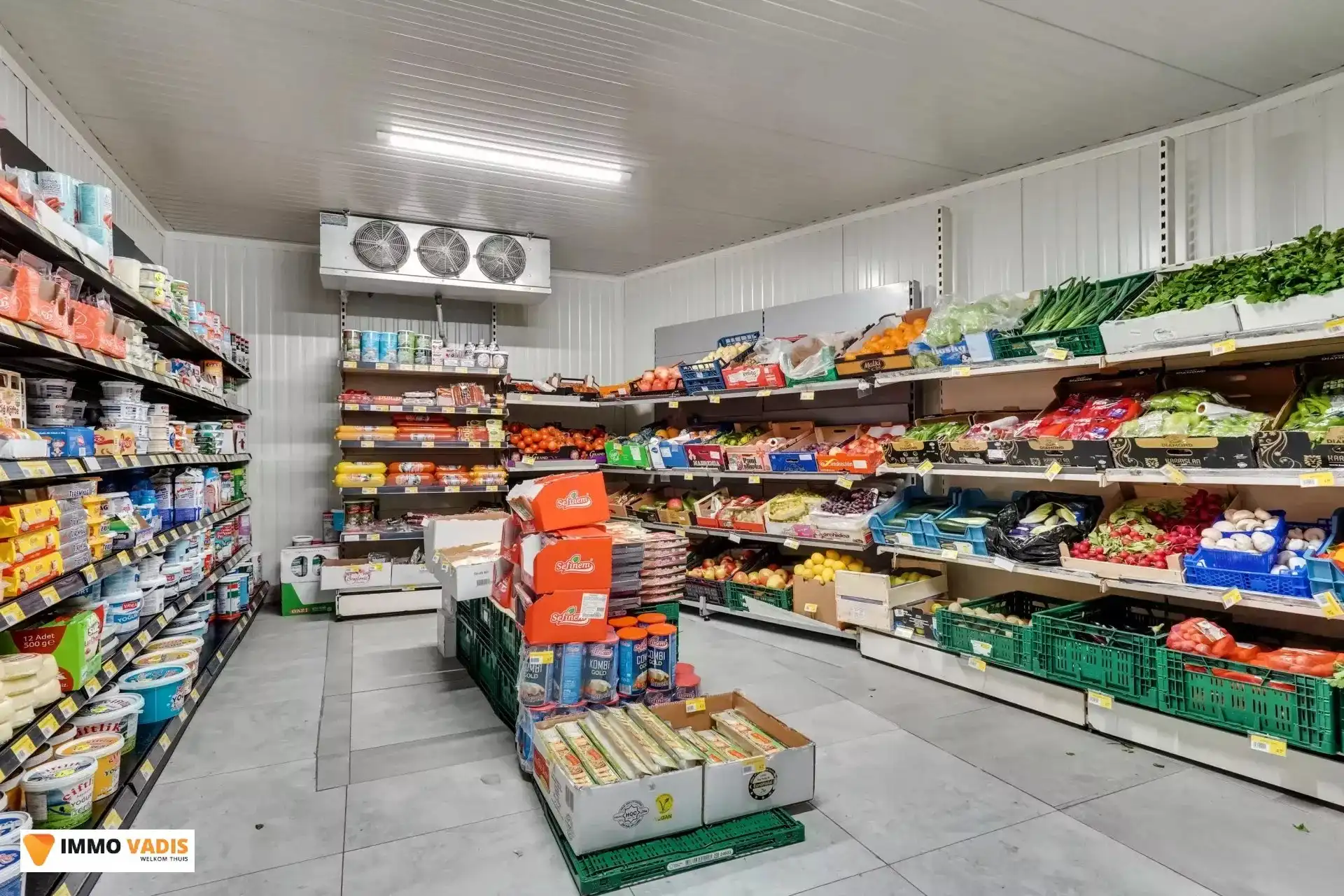 Handelspand met woonst en naastliggende woning foto 6