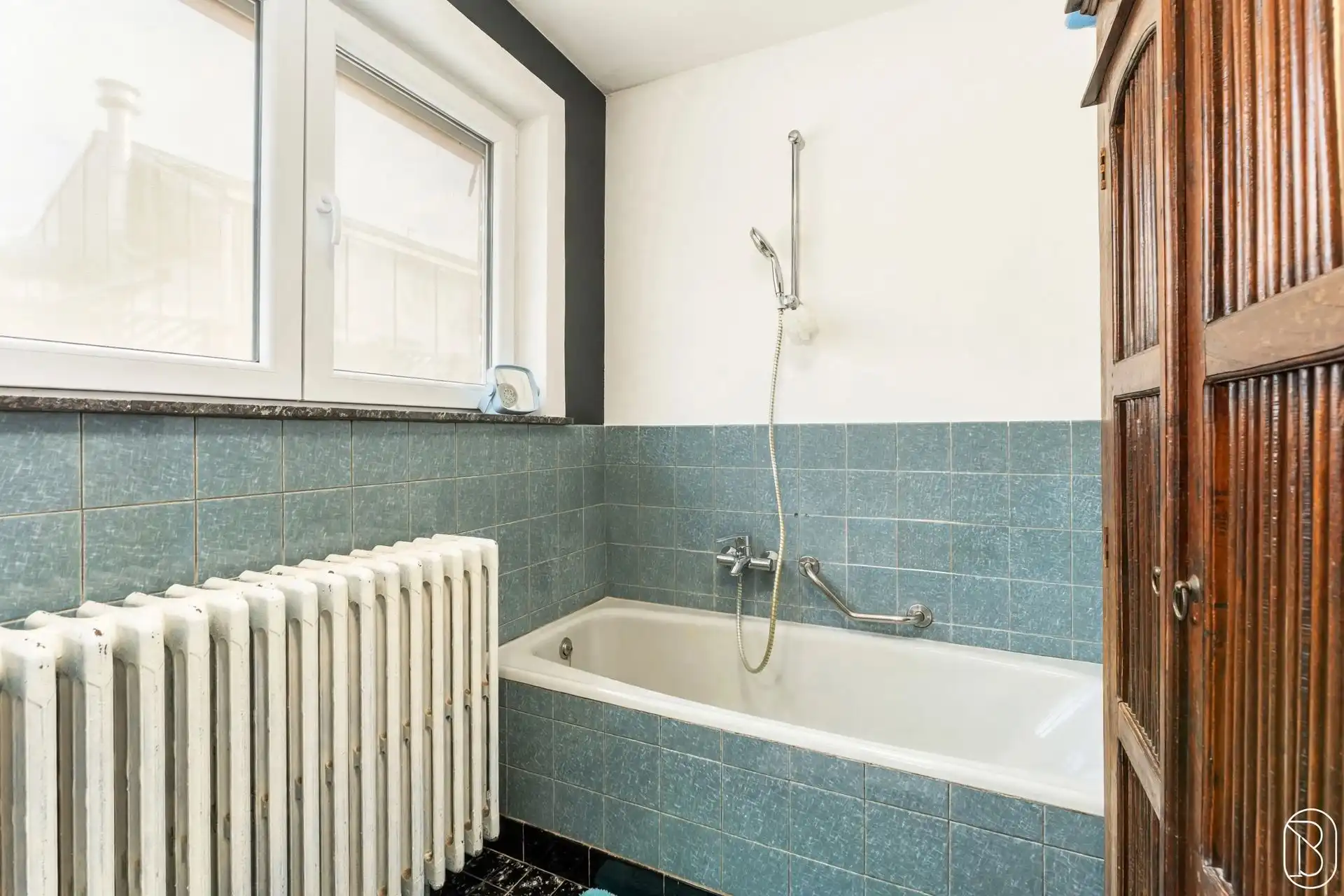 Ruime woning met tuin en handelsgelijkvloers foto 11