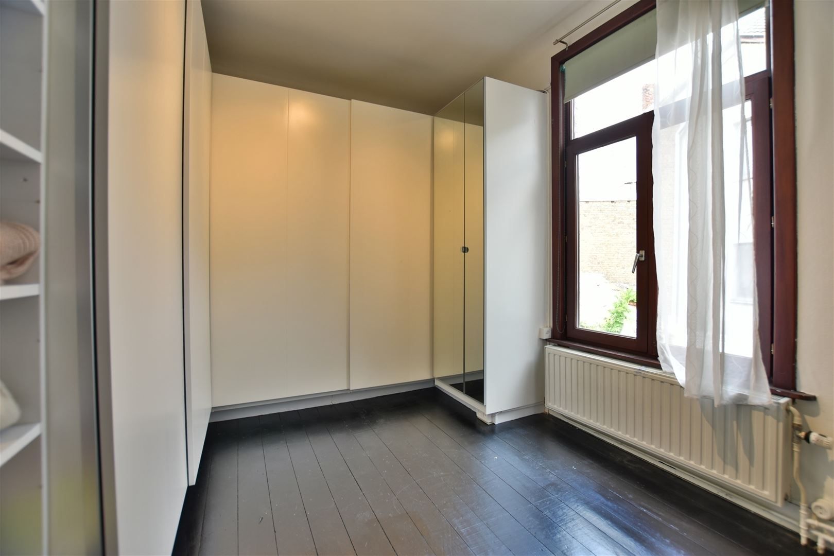 Karaktervolle, ruime woning met 6 slaapkamers, binnenkoer met jacuzzi en topligging! foto 16