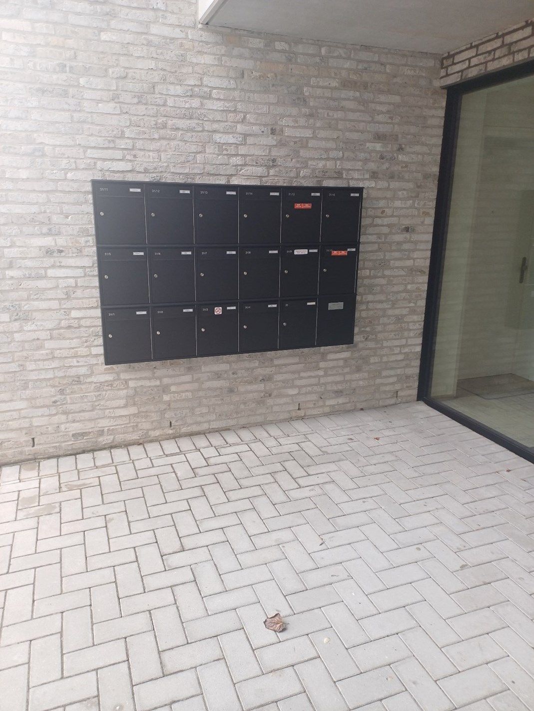 Instapklaar gelijkvloers appartement in Peer centrum met ruim terras + tuintje. foto 30