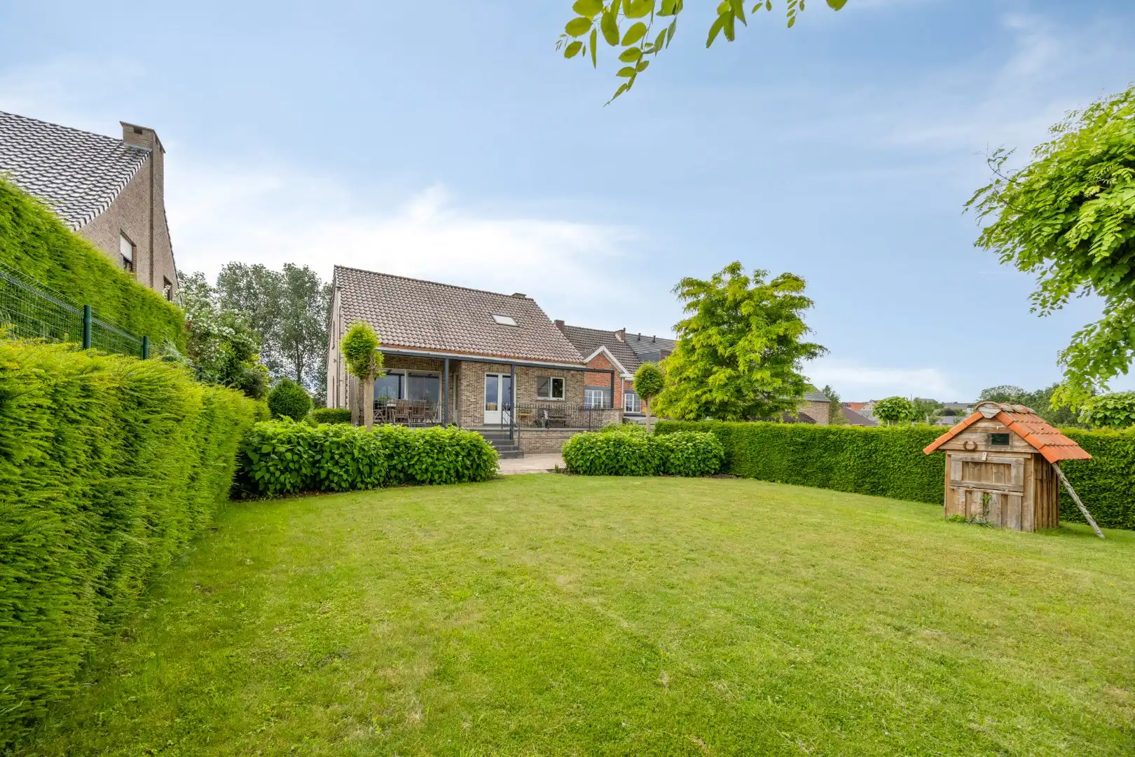 Ruime, verzorgde woning met prachtige tuin en terras - rustig gelegen te Rutten foto 2