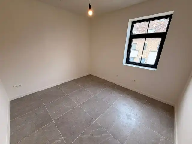 Halfopen nieuwbouwwoning met 4 slaapkamers gelegen te Opitter. foto 16