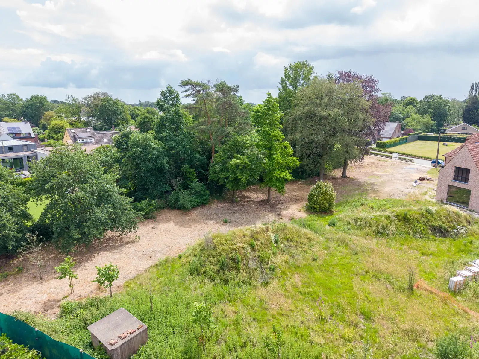 Vrijstaande woning bouwgrond foto {{pictureIndex}}