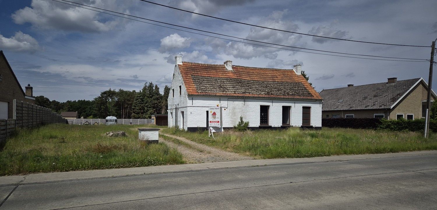 Hoofdfoto van de publicatie: Te renoveren hoeve of nieuwbouwproject op ruim perceel van 2.404 m² – Westerlo