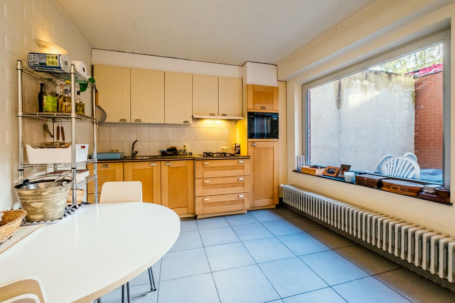 Ruim gelijkvloers appartement met garage! foto 6