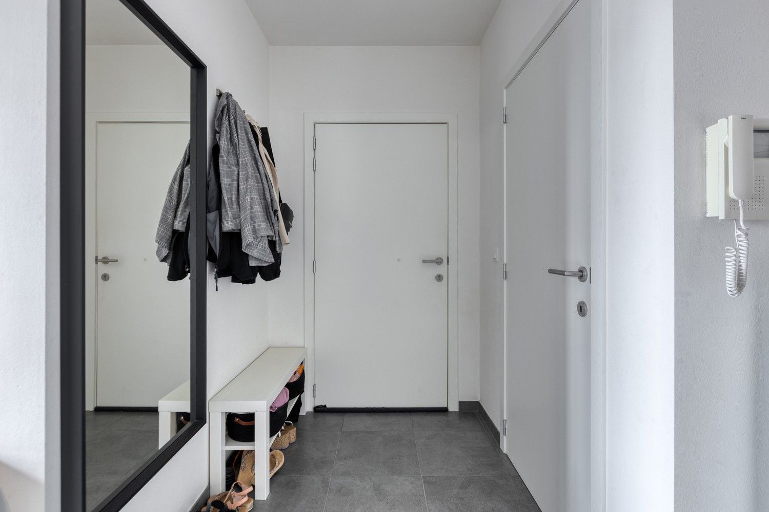 Instapklare en lichtrijke duplex met terras, garage én drie slaapkamers foto 3