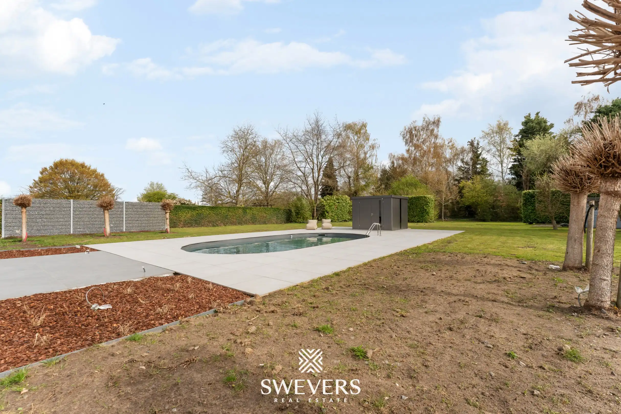 Volledig gerenoveerde villa met zwembad op prachtig perceel van 27a 49ca in Herk-de- Stad foto 27
