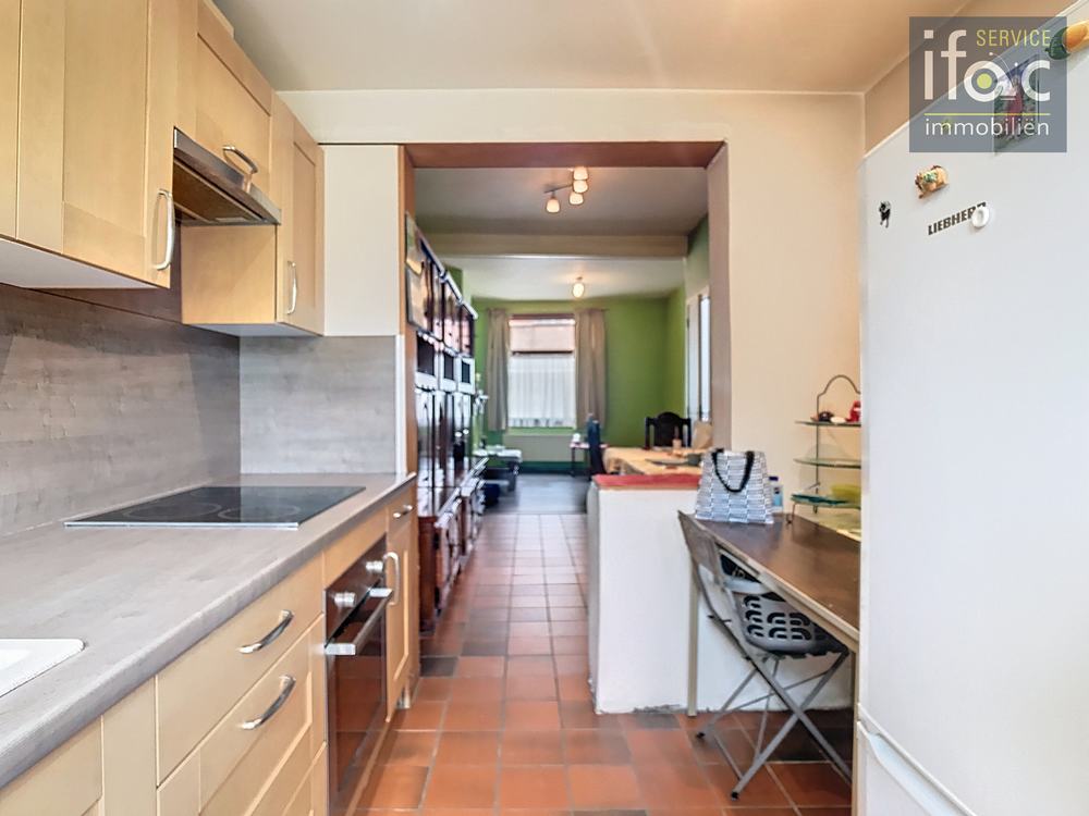 Rijhuis te koop foto 6