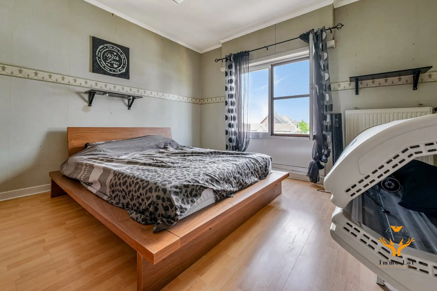 Halfopen bebouwing met tuin en garage in centrum Kalken foto 12