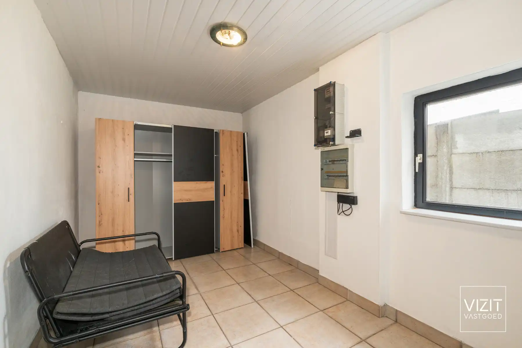 Rustig gelegen halfopen woning met tuin in Meerbeke foto 9