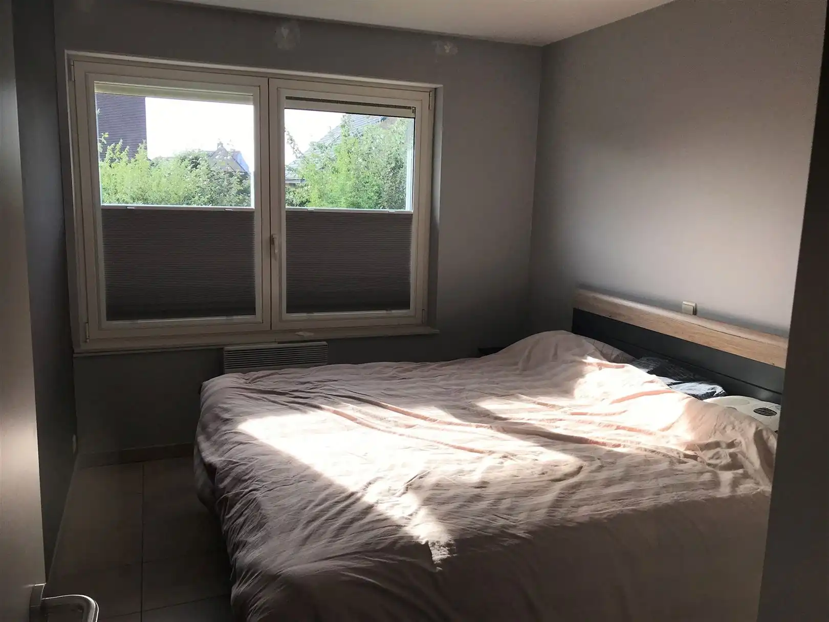 Gelijkvloers 2-slaapkamerappartement met een tuin foto 7