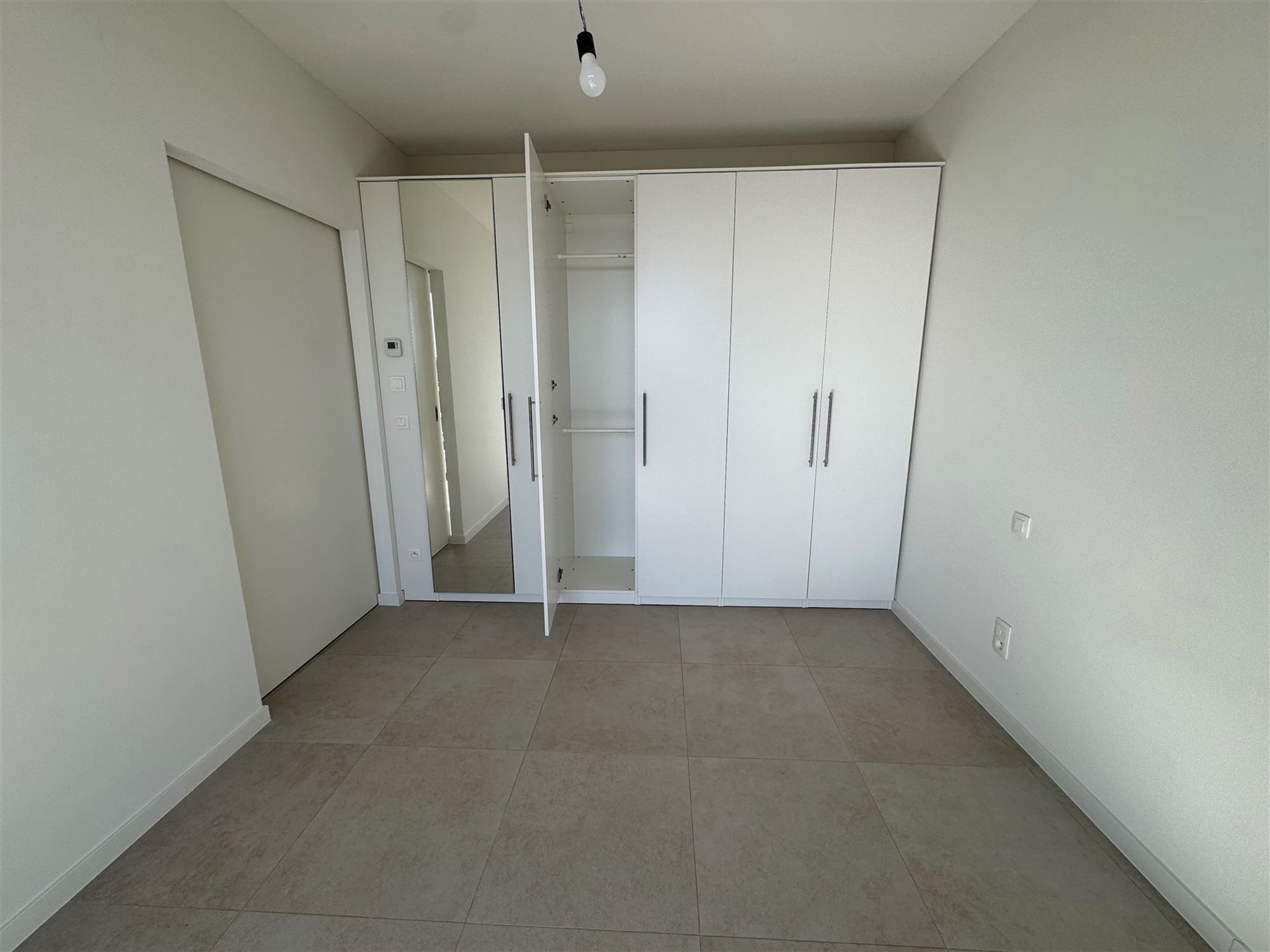 NIEUWBOUW APPARTEMENT (66M²) MET 1 SLAAPKAMER EN RUIM TERRAS TE BERINGEN CENTRUM  foto 7