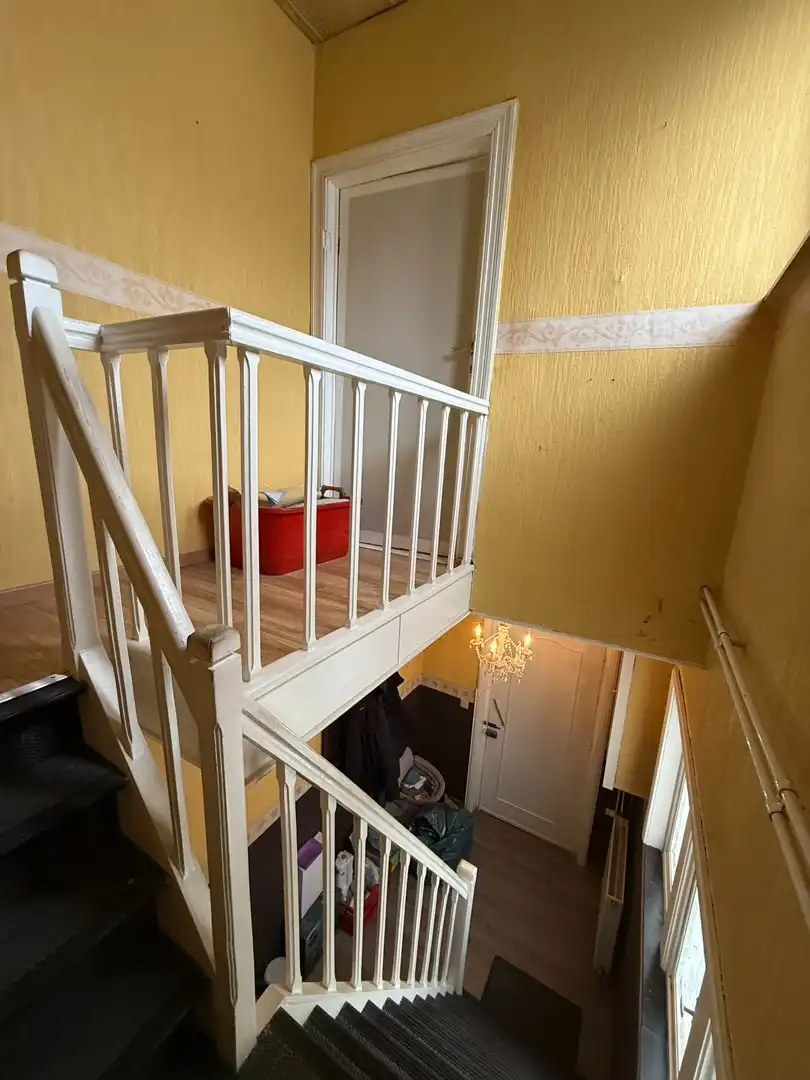 Opbrengsteigendom bestaande uit 2 halfopen woningen met garage en tuin te Hechtel. foto 12