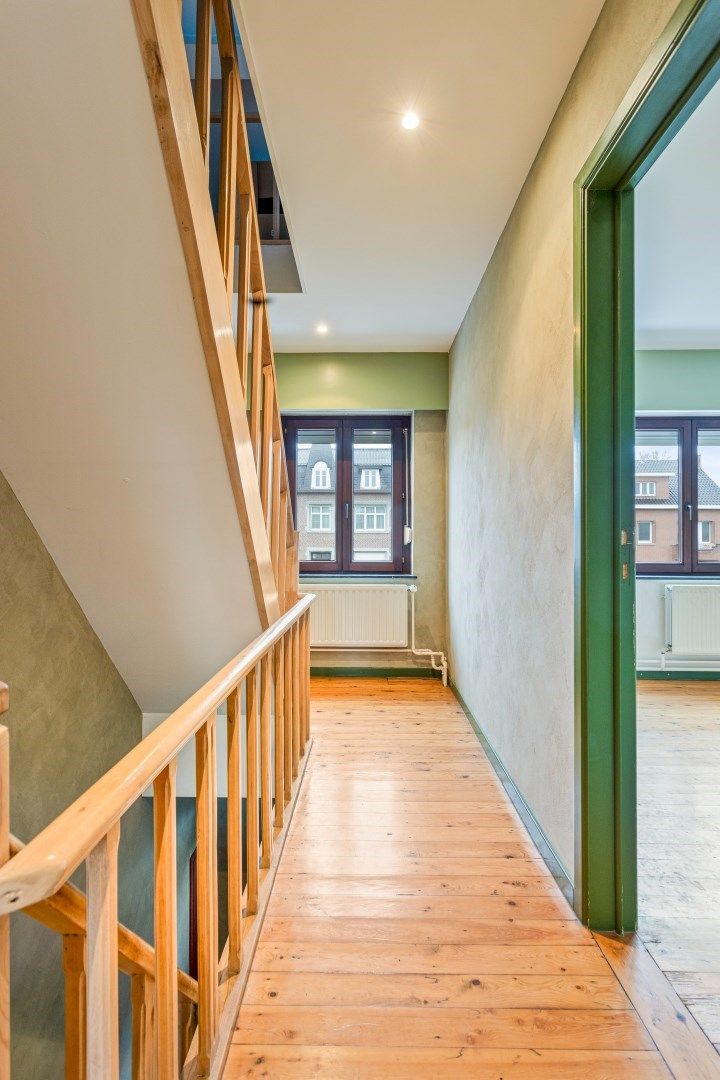 Verrassend ruime woning met knap terras en diepe tuin foto 20