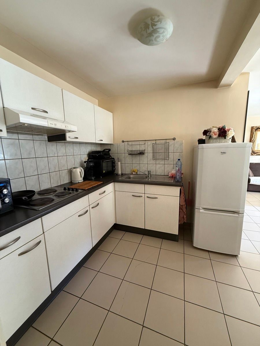 Instapklaar appartement met terras op toplocatie in Genk foto 5