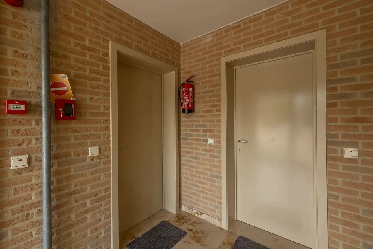Ruim gelijkvloers wonen met tuin én rendement. foto 27