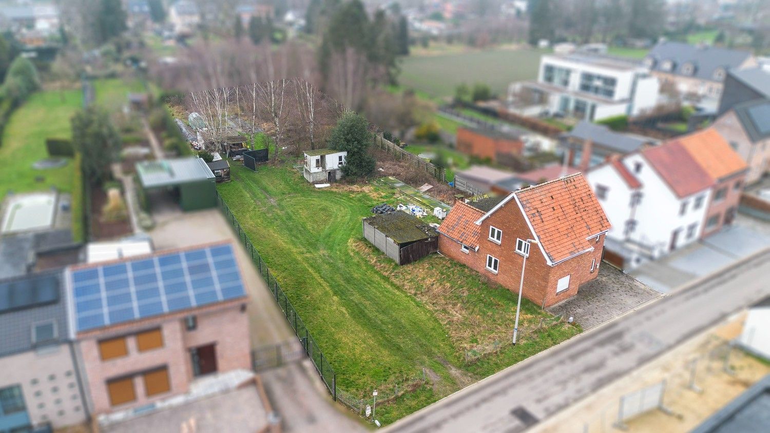 Te renoveren woning met veel mogelijkheden op een ruim perceel van 32a40ca te Lanaken! foto 14