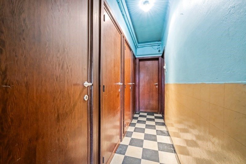 Ruime te renoveren rijwoning met zeer veel mogelijkheden en tuin foto 17