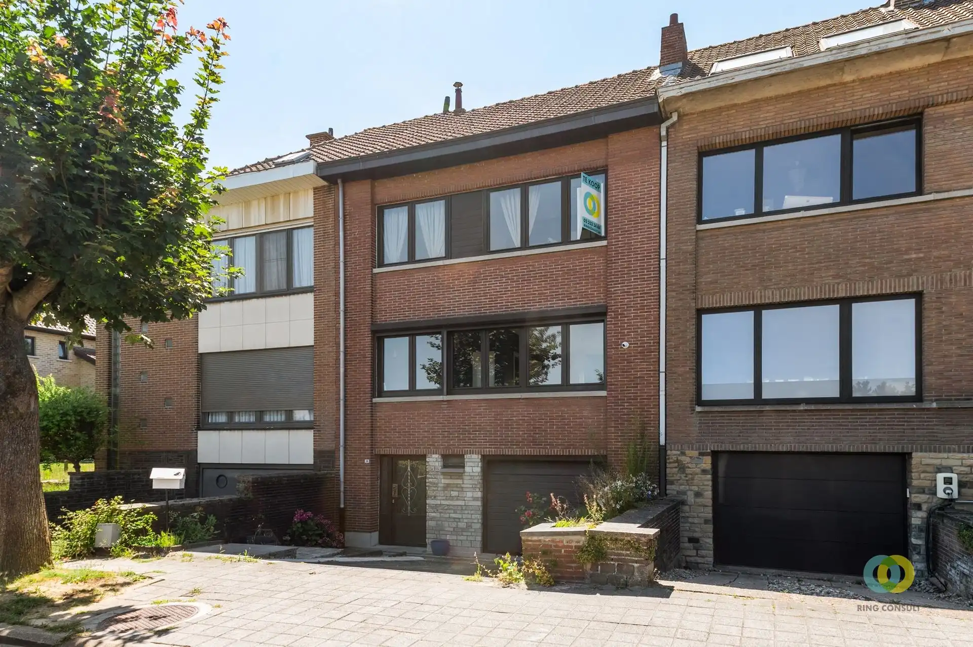 Bel-etagewoning met garage en tuin foto {{pictureIndex}}